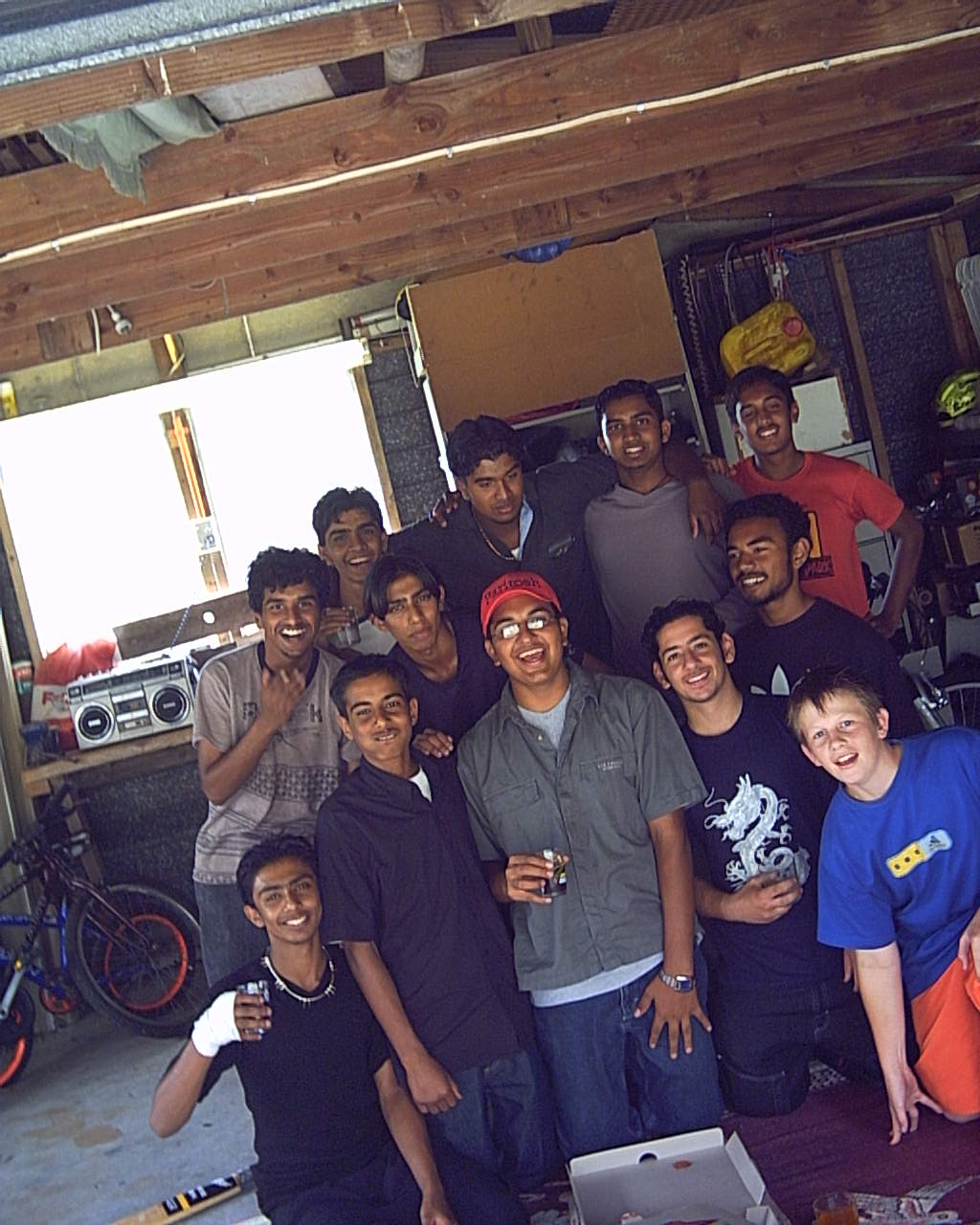 SECOND GUY TO THE LEFT BOTTOM ROW - WHAT THE FUK IS HE DOIN