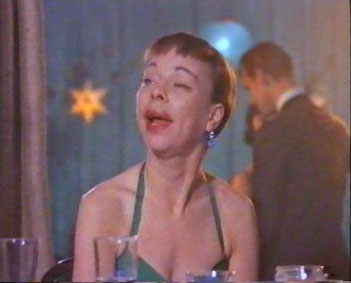 Carol, as Gladys, makes a scene at Hernando's Hideaway