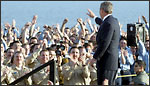 President Bush addressing the troops aboard the Lincoln....