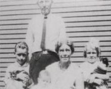 Norma Jeane with the Bolenders, Norma Jeane is holding Tippy her dog