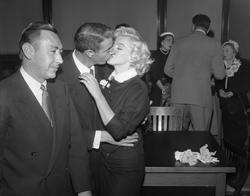 Marilyn Monroe and Joe DiMaggio at San Francisco City Hall, January 14, 1954.