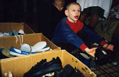 Distributing shoes at an orphanage in the Donbas region.