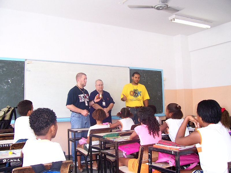 Bob Cull and I presenting the gospel to the Brazilian students in a classroom.