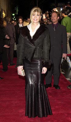 Actress Markie Post wearing a sexy leather skirt
