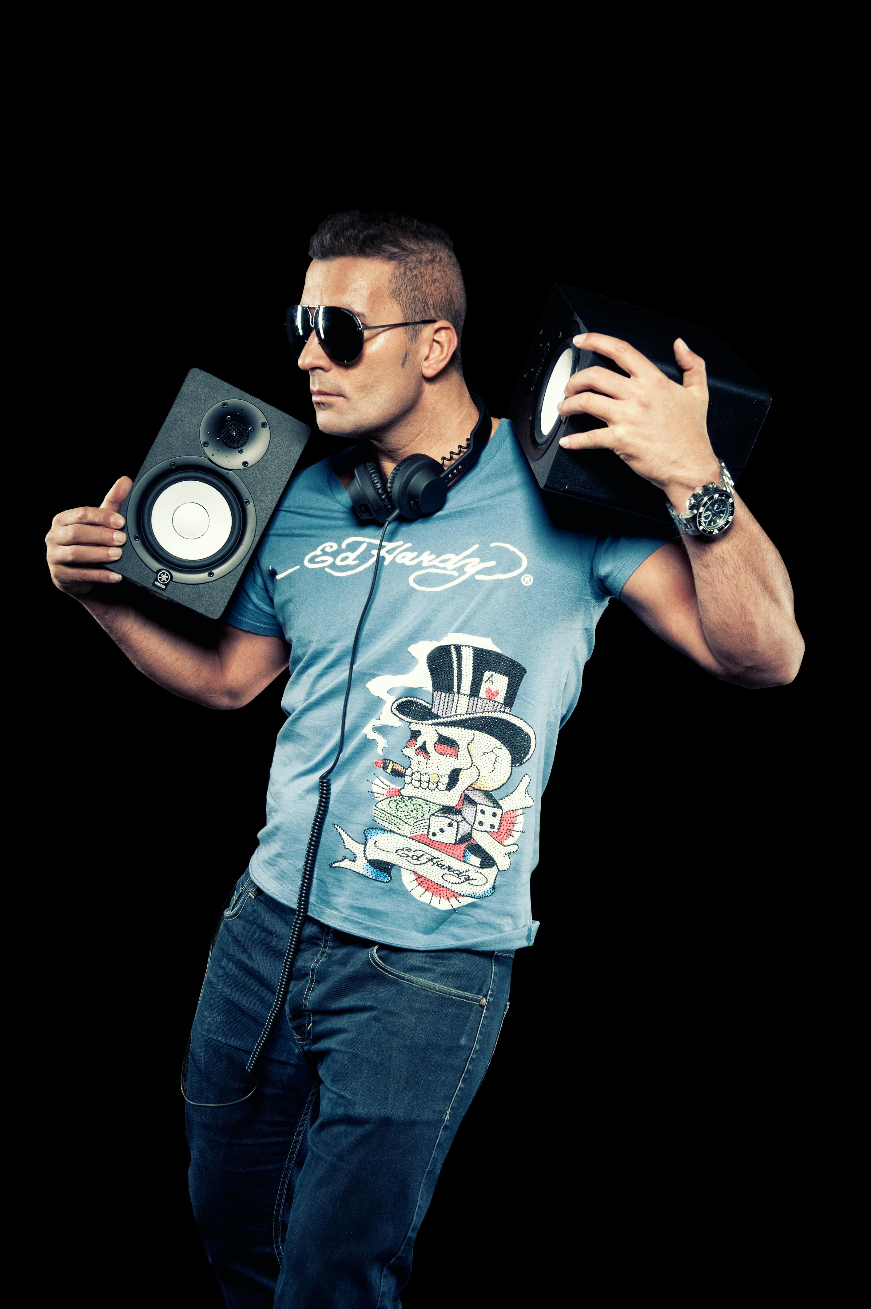 dude holding speakers