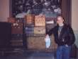 Tom with luggage left behind by immigrants at Ellis Island, New York.