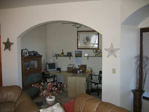 The Study/Den is tucked away next to Living Room - 2 Desks
