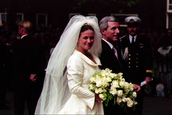 Annette enters the church with her father