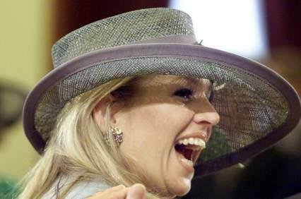 Maxima gigling at the wedding of prince Constantijn