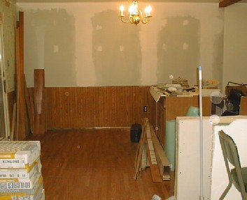 Dining Room - Floor is in and drywall is up.&nbsp; Needs trim, finish work and paint (and a new light fixture)