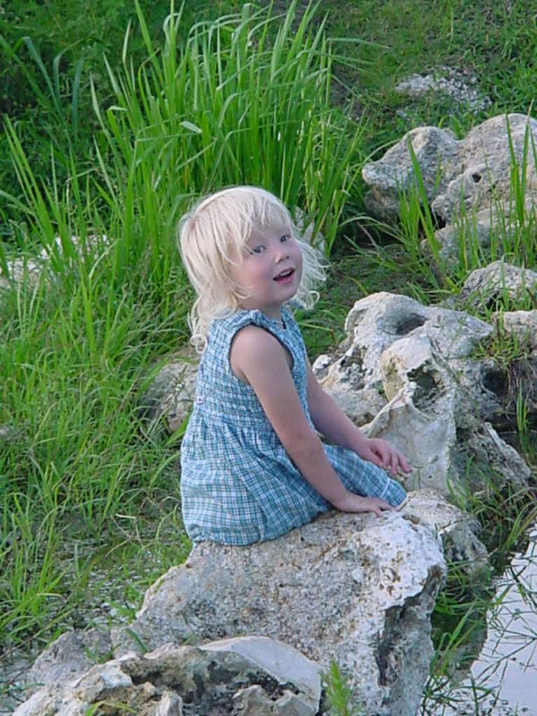 Sara on rocks at Memorial Park in Gainesville, 5/28/01.