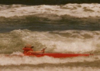 Chris surfing