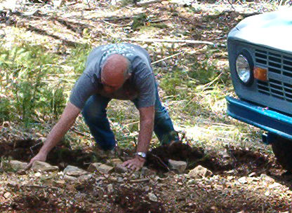 This is a very rare photo of Wayne out of his rig, clearing the path for us.