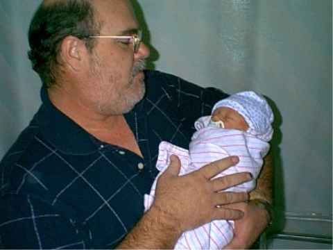 Grandpa knows how to hold a baby too!!