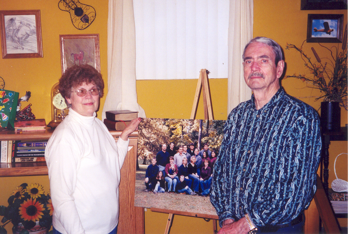 Christmas 2002 with a photo of our 7 children & spouses and 16 grandchildren