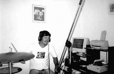 Junior playing his ........( drums ???)