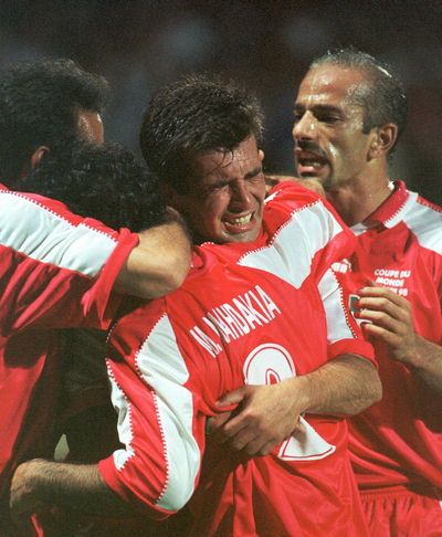 Iranian national players celebrating their first win in the world cup