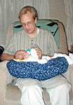 E2-2August122004_2-MattfeedingEmily.jpg