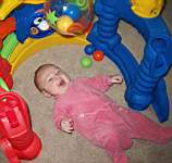 E5-04-EmLaughingAtSwingingBall.jpg