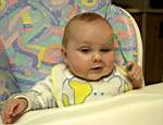 2004112914wl_Emily4mo_scratchingheadwithspoon.jpg