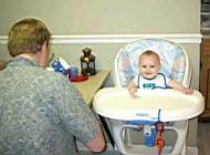 20050103_02a-DaddyMatt_feedingEmily-5mo.jpg
