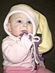 20050107_21w-Emily-6mo_Mainesweatshirt_fromAuntAprilBoulier_StockingCap_fromAuntBarbaraMartel.jpg