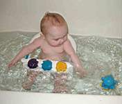 20050116_04w-EmilyHiggins-6mo_bathchair_bigbathtub-TatlowsBlackfootID.jpg
