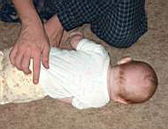 20050127_02w-DaddyMatt_teach_Emily-6mo_rollover.jpg