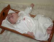 20050206_03w-EmilyGraceHiggins-almost7mo-GrandmaMaggieHigginsdollcradle.jpg