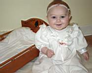 20050206_06a-EmilyGraceHiggins-almost7mo-GrandmaMaggieHigginsdollcradle.jpg