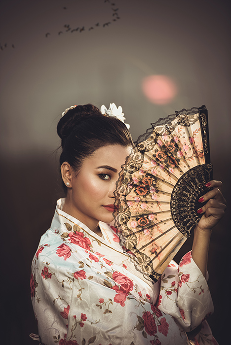 woman with fan