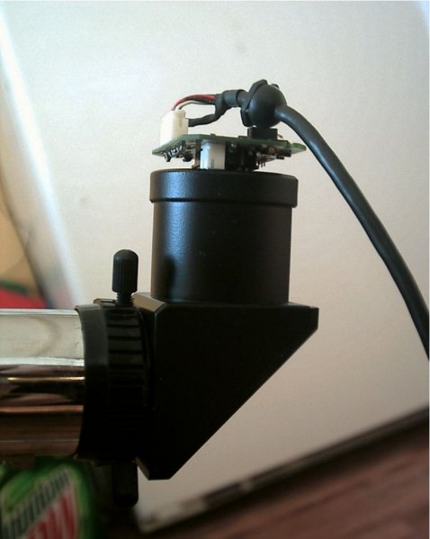 put a web cam  in a telescope