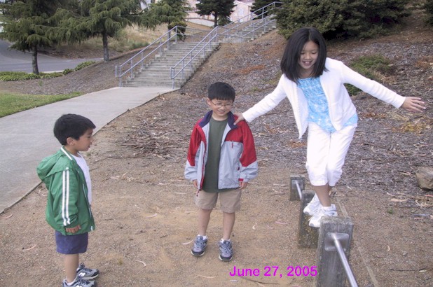 Emily walking on a beam