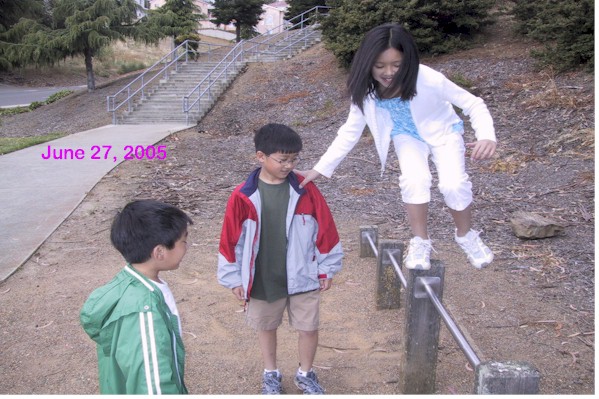 Emily walking on a beam
