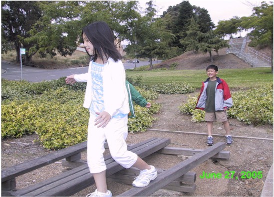 Emily walking on a beam