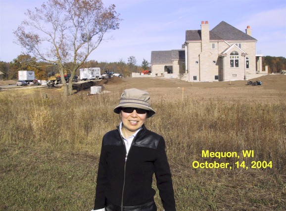 Grandma in front of neighbour's house 