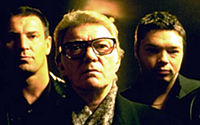Bricktop (Alan Ford) (Center) and his top two thugs