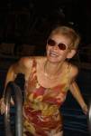 Marghe pops out of a pool at Maui, saying 