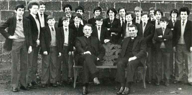 Keith O'Brien, when rector, came across the above photo and arranged for this one to be taken at the same bench in 1982. The hairstyles don't leave much room for hats.