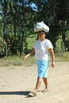 a Lady carrying Tortillas
