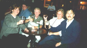 raising their drinks