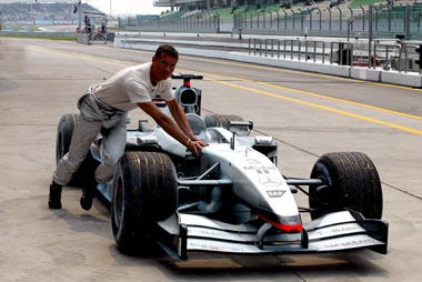Dc pushing his McLaren