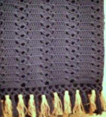 afghan close up; navy blue and gold