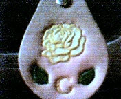 rose, yellow w/ initial