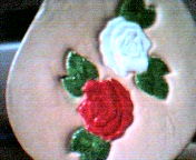 2 miniature roses, one red, one white on key fob