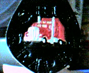 semi, red, w/ Grim Reaper