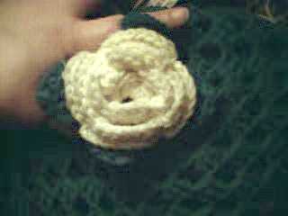 yellow rose in center of afghan