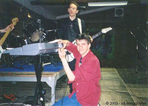 65 Megabytes Sets Up His Keyboard For A Performance In The Band "C60K"