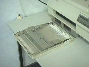 Replace
        plastic cover on cartidge tray