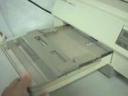 Insert
        cartridge tray into printer